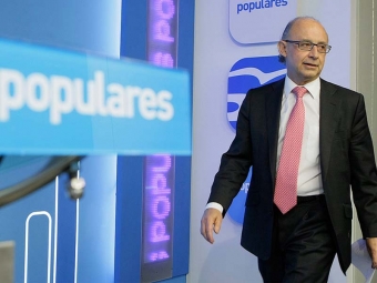 Skatteministern Cristóbal Montoro har fullt sjå med att balansera den statliga kassan.