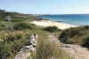 På stranden Baroña i Galicien hamnade nudister i onåd hos lokalbefolkningen på 1980-talet. Det blev upptakten till att nudism legaliserades i hela landet.