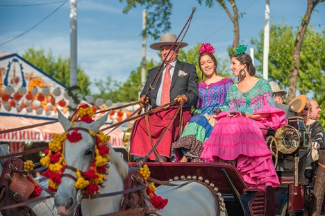 Feria de Abril i Sevilla innebär hästar, kläder, mat och framför allt flamenco.